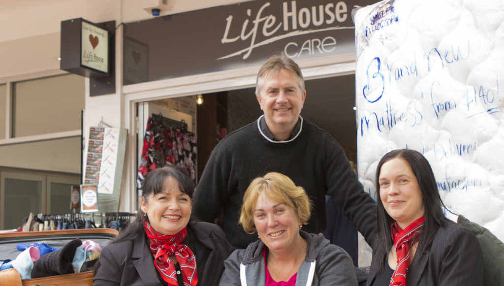 HELPING HANDS: Julie Alderman (centre) with Pastor Tony Peter from Lifehouse Care and Alison and Alina from PRD Realty. INSET: The fire which destroyed most of Julie’s possessions earlier this month. HELPING HANDS: Julie Alderman (centre) with Pastor Tony Peter from Lifehouse Care and Alison and Alina from PRD Realty. INSET: The fire which destroyed most of Julie’s possessions earlier this month.